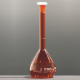 Volumetric flask.amber. white print. plastic stopper Normax 10/19 